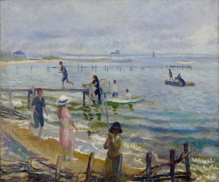 The thin sliver of beach in the bottom left corner of this horizontally oriented canvas features a loosely painted scene of multiple Caucasian figures dressed for a summer’s outing. Two thin wooden piers extend horizontally into the ocean, filling most of bottom two-thirds of the canvas. A couple sailboats dot the horizon and a third boat is pulling up to the pier in the foreground. The sky filling the upper third of the canvas is light blue with lilac tinged clouds reflecting in the water below.