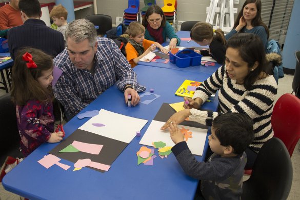 Families create art in the classrooms