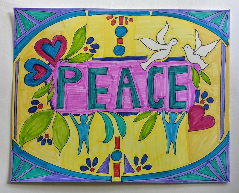 A drawing with the word "PEACE" in the center and doves, flowers, and hearts all around it