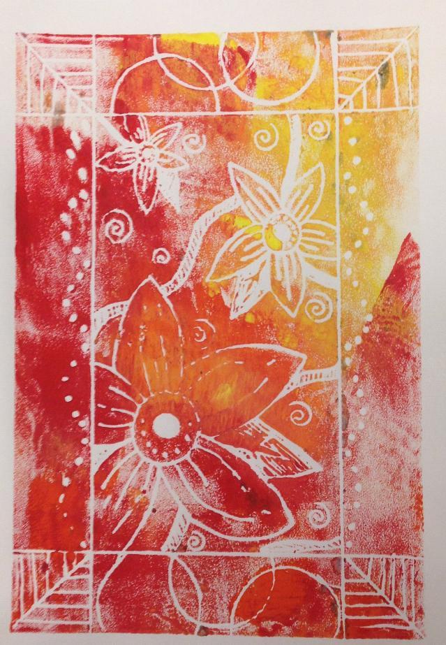 Red and yellow etching of flowers on white paper