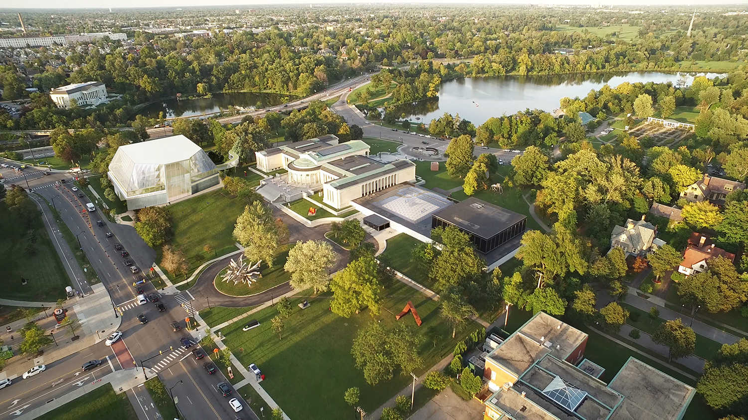 Aerial view of the museum's campus with a rendering of the new north building in the upper left corner