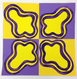 Image of organic forms in a yellow and purple pattern