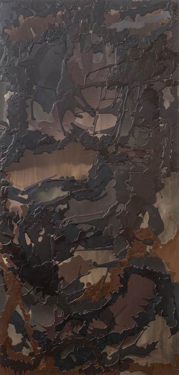 Close up of a textured abstract artwork in various shades of brown