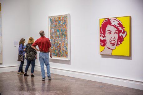 Visitors with Jasper Johns&#039;s Numbers in Color, 1958–59, and Roy Lichtenstein&#039;s Head—Red and Yellow, 1962, in Giant Steps: Artists and the 1960s