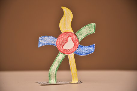 A cardboard cutout of a walking flower