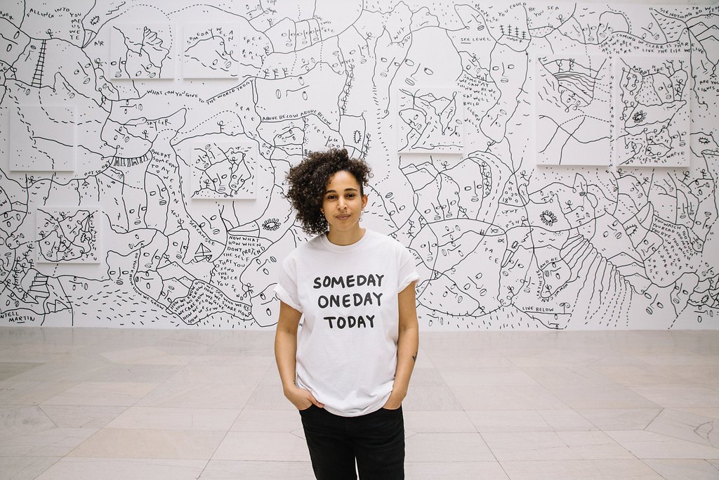 Shantell Martin in front of her mural in the Albright-Knox&#039;s Sculpture Court