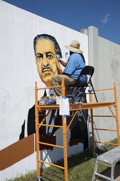 John Baker working on a portrait of Thurgood Marshall for The Freedom Wall