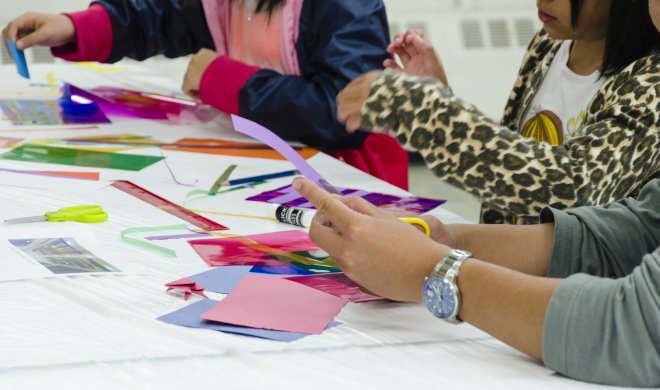 Photograph of participants at a drop-in art activity