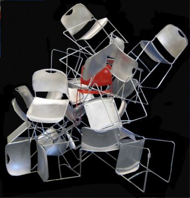 Image of a sculpture made from metal chairs