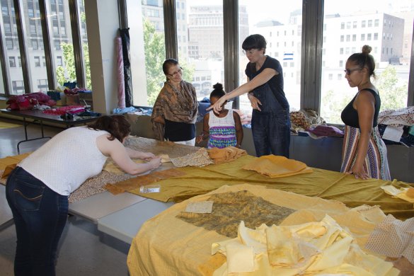 Amanda Browder and volunteers sew fabric for Spectral Locus at the Buffalo and Erie County Public Library&#039;s Central Library