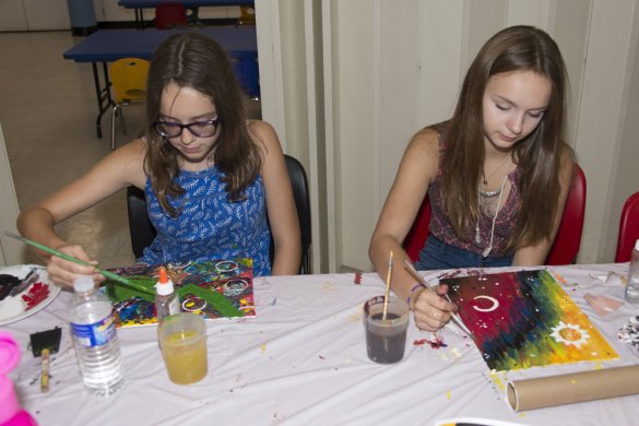 Photo of teens making artwork