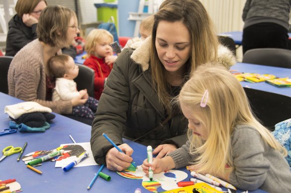 Families making art in the classroom