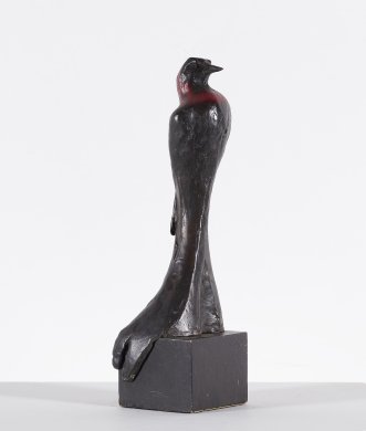 [cast bronze bird with red and black patina]