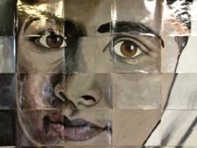 Grid painting of a woman's face