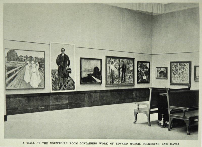 Sepia image of paintings hanging on two walls of a room