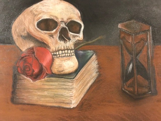 A drawing of a skull with a live rose in its teeth resting on a book on a table. An hour glass sits next to the skull and book on the table.
