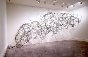 Installation view of John Bisbee: Arc and Plume