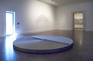 Installation view of REMIX: Recent Acquisitions, featuring Mona Hatoum&#039;s + and -, 1994–2004, in the foreground, and Teresita Fernández&#039;s Mirror Canopy, 2007, on the wall