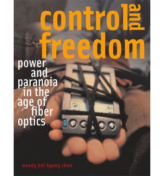 Cover of Control and Freedom: orange text on image of person&#039;s hands bound to a palm pilot