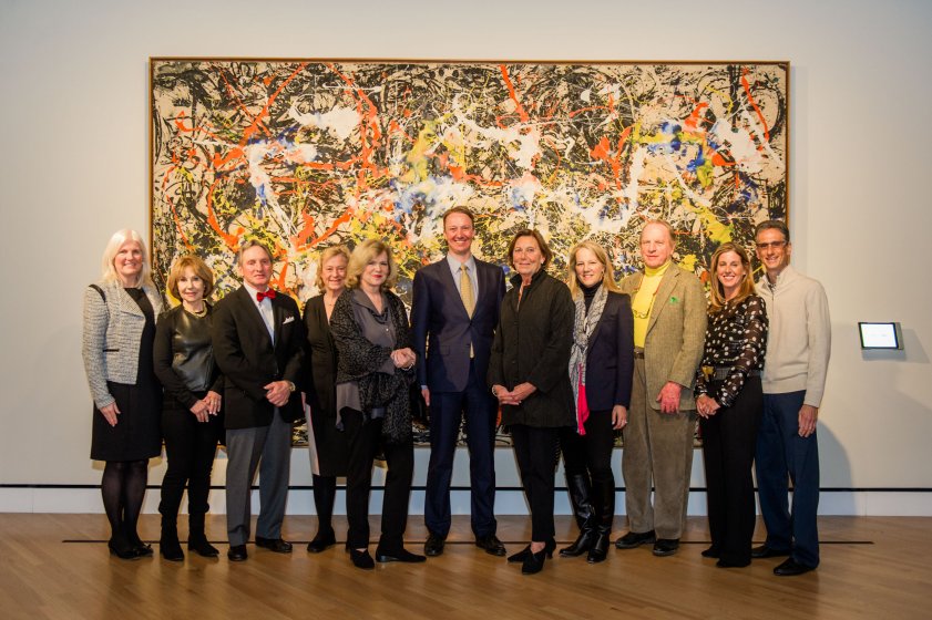 Director’s Travel Series participants in front of Jackson Pollock’s Convergence, 1952