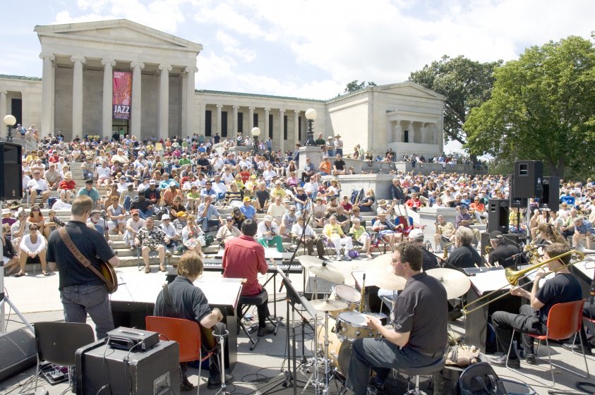 Guests sit on the Delaware Stairs to watch a jazz concert