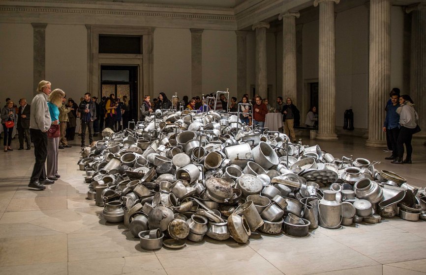 Guests around Subodh Gupta&#039;s This is not a fountain, 2011–13, in We the People: New Art from the Collection